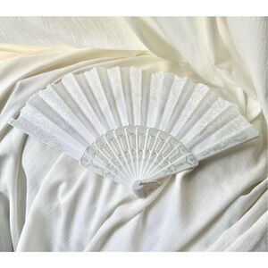 White hand fan with sparkle detailing ￼